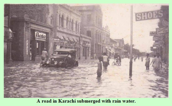 Karachi Old Photos - A road in Karachi submerged in rain water before Partition - Rare Pictures of Karachi Karachi Rare Pictures: A road in Karachi submerged in rain water before Partition - Old Photos of Karachi