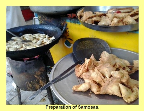 Typical Pakistani Food: Fresh crispy Samosas are being prepared - Pakistani Dishes - Pakistani Cuisine
