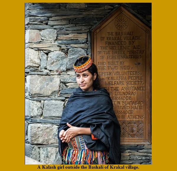 Kalash Photos; A Kalash girl outside the Bashali of Krakal village - Images of Kalash Valleys, Chitral Kalasha Pictures: A Kalasha girl outside the Bashali of Krakal village - Photos and Images of Kalash Valleys of Chitral