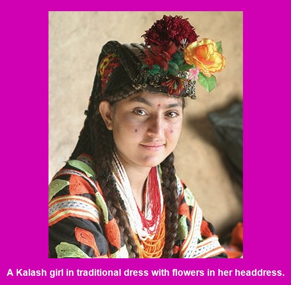 Kalash Photos, Images; A Kalash girl in traditional dress with flowers in her headdress - Kalash Valleys Pictures, Chitral Kalasha Pics, Images: A Kalash girl in traditional dress with flowers in her headdress -Images Kalash Valleys of Chitral