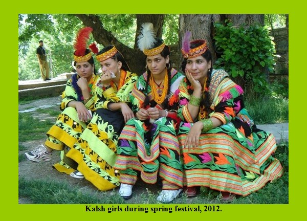 Kalash Photos, Images; Four Kalash girls during spring festival, 2012 - Kalash Valleys Pictures, Chitral Kalasha Pics, Images: Four Kalash girls sitting under a tree during Spring Festival - Photos of Kalash Valleys of Chitral