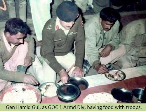 Gen Hamid Gul, as GOC 1 Armd Div, having food with troops