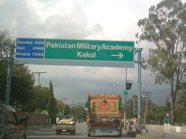 A road in Abbotabad Photos of Abbottabad - Road Signborad showing direction of PMA - Abbotabad Photos Pics
