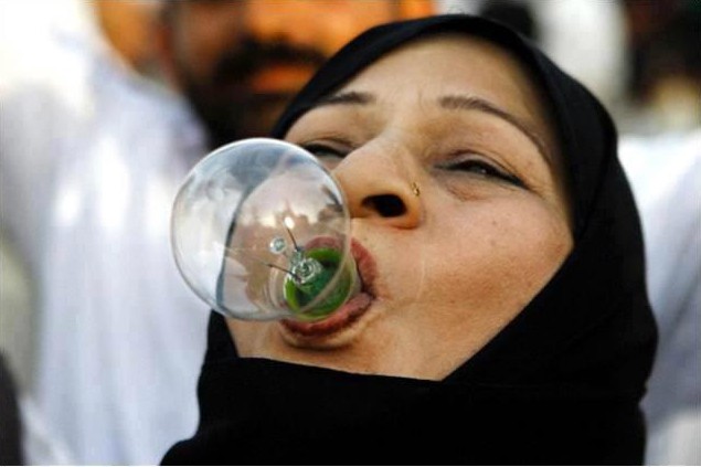 Wapda funny jokes: A unique way of protest against Wapda load shedding A unique way of protest against Wapda load shedding. woman holds electric bulb in her mouth