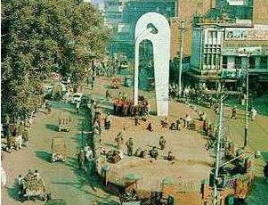 Photos of Peshawar - Photo of Chowk Yadgar, Horse Shoe Style White Marble Arched Structure Built in 1969 - Pics Peshawar