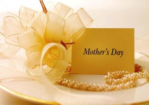 Best sayings, quotes about Mother's Day - Mother's day yellow colour card and pearls in a dish - Best Quotes about Mother's Day