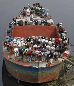 Namaz (Salat) Pictures - Muslims are offering Namaz in three tiers on the deck of a big boat - Namaz Photos