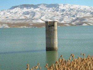 Snow covered hills and lake in Balochistan