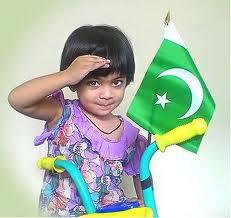 Pakistan Flag Lovers - A little girl displays Pakistani flag on her bicycle and salutes - Display of Pakistani flag Proud Display of Pakistani Flag - A cute little girl displays Pakistani flag on her bicycle and salutes - Pakistani Flag Lovers